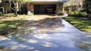 driveway before pressure wahing in cobbs landing palm harbor