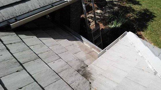 clean gutter on tile roof